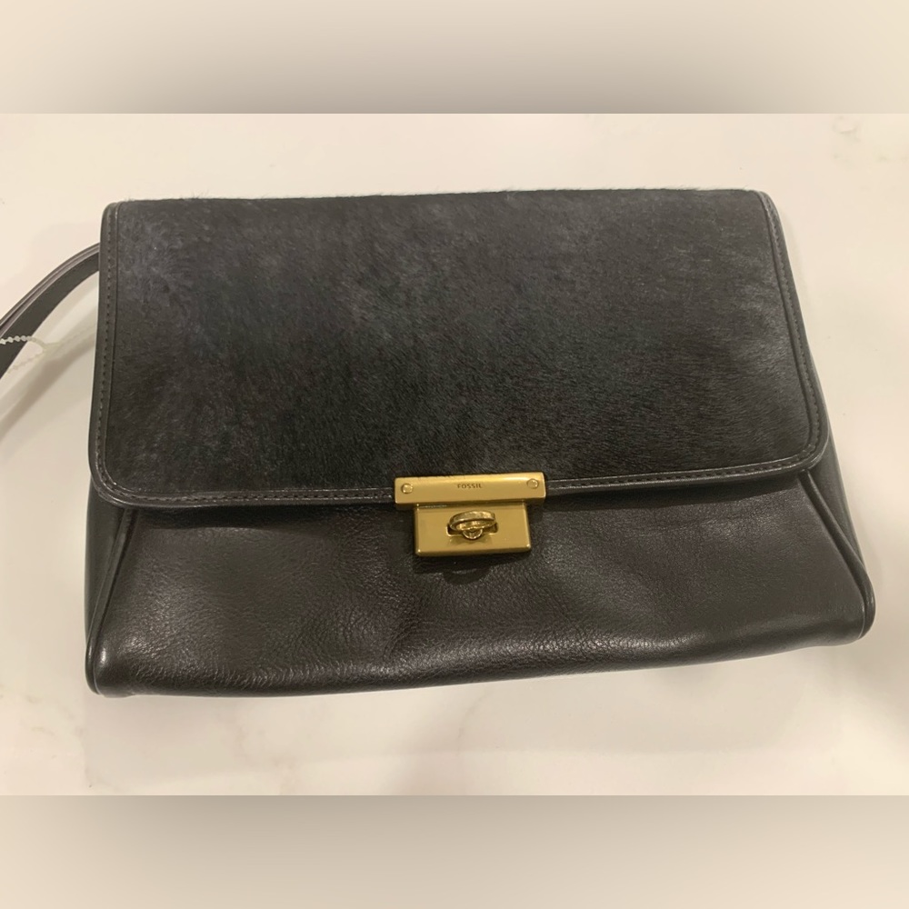 Like new Fossil brand black leather and calf hair wristlet or clutch